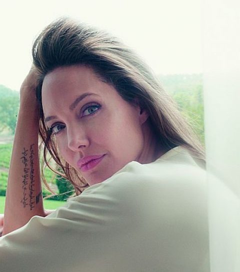 ELLE sprak met de man achter de onzichtbare tatoeage van Angelina Jolie