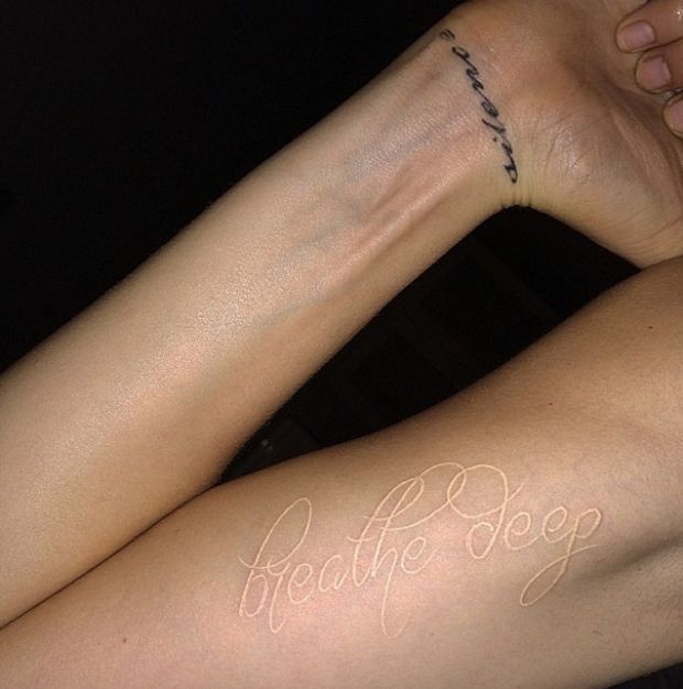 Cara's kersverse tattoo