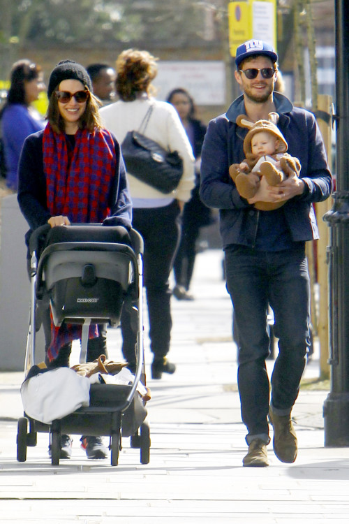 **USA ONLY** *EXCLUSIVE* London, UK - Jamie Dornan and wife Amelia Warner are seen enjoying a walk in the London sunshine with their baby daughter who is dressed like a rabbit. The "Fifty Shades of Grey" actor looked happy and relaxed as he cradled the baby in his arms, smiling at onlookers as they headed to a local coffee shop. AKM-GSI March 13, 2014 **USA ONLY** To License These Photos, Please Contact : Steve Ginsburg (310) 505-8447 (323) 423-9397 steve@akmgsi.com sales@akmgsi.com or Maria Buda (917) 242-1505 mbuda@akmgsi.com ginsburgspalyinc@gmail.com